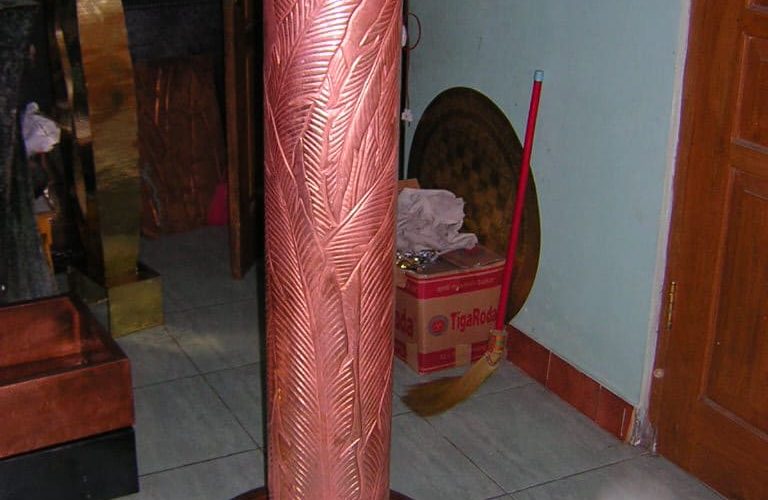 air mancur silinder ornamen daun